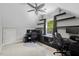 Bright office space with built-in desk, multiple computer monitors, and large windows for a productive work environment at 6819 Rainwater Rd, Raleigh, NC 27615