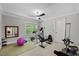 Bright workout room featuring modern exercise equipment, perfect for staying active and healthy at 6819 Rainwater Rd, Raleigh, NC 27615