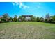 Outdoor amphitheater in a park with manicured lawns and shade trees at 708 Copperline Dr # 101, Chapel Hill, NC 27516