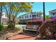 Charming neighborhood with cozy benches surrounded by blooming trees near lovely homes at 708 Copperline Dr # 101, Chapel Hill, NC 27516