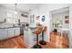 Kitchen featuring modern appliances, granite countertops, and a breakfast bar at 708 Copperline Dr # 101, Chapel Hill, NC 27516