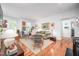 Bright living room featuring hardwood floors, white walls, and lots of natural light at 708 Copperline Dr # 101, Chapel Hill, NC 27516