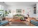 Living room with hardwood floors, white walls, cozy seating, and stylish décor at 708 Copperline Dr # 101, Chapel Hill, NC 27516