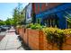 Charming street view featuring storefronts with outdoor planters and lively atmosphere at 708 Copperline Dr # 101, Chapel Hill, NC 27516