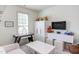 Recreation room featuring an air hockey table, TV, and stylish furnishings at 715 Barlang Cir, Fuquay Varina, NC 27526