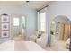 Light-filled main bedroom with ensuite bathroom and dual windows at 715 Barlang Cir, Fuquay Varina, NC 27526