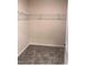 Spacious walk-in closet with shelving for organized storage at 718 Colby Pl, Durham, NC 27713