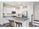 Beautiful kitchen with stainless steel appliances, a center island, and pendant lighting at 718 Colby Pl, Durham, NC 27713