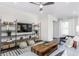 Stylish living room featuring a modern entertainment center and decorative accents at 718 Colby Pl, Durham, NC 27713