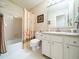 Bathroom featuring a shower-tub combo, a standard toilet, and a vanity at 725 Van Thomas Dr, Raleigh, NC 27615