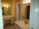 Bathroom with a vanity, ample storage and attractive countertops at 725 Van Thomas Dr, Raleigh, NC 27615