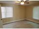 Spacious bedroom featuring hardwood floors and a ceiling fan at 725 Van Thomas Dr, Raleigh, NC 27615