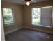 Comfortable bedroom featuring hardwood floors and natural light at 725 Van Thomas Dr, Raleigh, NC 27615