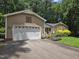 Charming home with a two-car garage and a beautifully landscaped front yard at 725 Van Thomas Dr, Raleigh, NC 27615