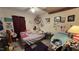 Cozy bedroom featuring a bed, decor, and natural light, creating a comfortable personal space at 7312 Ray Rd, Raleigh, NC 27613
