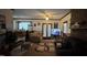 Open-concept living room with dining area, offering ample space for entertaining and relaxation at 7312 Ray Rd, Raleigh, NC 27613