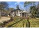 Exterior view of a two-story home with a well-manicured front yard and mature trees at 7420 Heartland Dr, Wake Forest, NC 27587