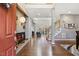 Inviting foyer with hardwood floors, open staircase, and stylish decor at 7420 Heartland Dr, Wake Forest, NC 27587