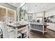 Kitchen area featuring dining space with modern appliances and sleek countertops at 7420 Heartland Dr, Wake Forest, NC 27587