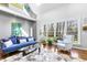 Bright and airy living room with a large window and comfortable seating at 7420 Heartland Dr, Wake Forest, NC 27587
