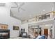 Bright and open living room featuring a staircase, fireplace and lots of light at 7420 Heartland Dr, Wake Forest, NC 27587