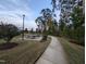 Scenic walking path through a beautifully landscaped community park at 825 Flower Manor Dr, Wendell, NC 27591