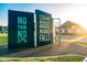 Outdoor workout area with motivational signage in a walkable neighborhood with homes and community green space at 825 Flower Manor Dr, Wendell, NC 27591