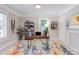 Bright office space with a wooden desk, stylish decor, and neutral walls at 919 Orient St, Durham, NC 27701
