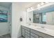 Bright bathroom featuring a double vanity with modern fixtures and a glass-enclosed shower at 101 Yuma Dr, Louisburg, NC 27549