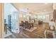 Open-concept dining area connected to the kitchen features a stylish chandelier and views to the living spaces at 101 Yuma Dr, Louisburg, NC 27549