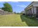 Large backyard with a lush green lawn, perfect for recreation and outdoor living at 1010 Smoke Willow Way, Rolesville, NC 27571