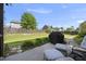 Backyard patio featuring comfortable seating, perfect for outdoor dining and relaxation at 1010 Smoke Willow Way, Rolesville, NC 27571