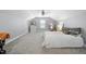 Bright bedroom with ample space, natural light, and a comfortable bed with patterned pillows at 1010 Smoke Willow Way, Rolesville, NC 27571