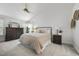 Serene bedroom with neutral decor, vaulted ceiling, and ample natural light at 1010 Smoke Willow Way, Rolesville, NC 27571