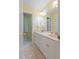 Bathroom with double vanity and marble floors, providing ample space and a stylish design at 102 Treadwell Ct, Cary, NC 27513