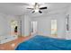 Spacious main bedroom with an ensuite bathroom, ceiling fan, and a bright atmosphere at 102 Treadwell Ct, Cary, NC 27513