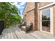 Private balcony with outdoor furniture and a view of the surrounding landscape at 1024 W Markham Ave, Durham, NC 27701