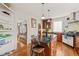 Open kitchen with a large island, hardwood floors, and ample space for cooking and entertaining at 1024 W Markham Ave, Durham, NC 27701