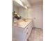 Bathroom featuring vanity with marble countertops and updated fixtures at 104 Silver Fox Ct, Cary, NC 27511