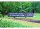 Community clubhouse sign showcasing Kildaire Farms Fitness & Racquetball Center amenities at 104 Silver Fox Ct, Cary, NC 27511