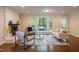 Inviting living room with fireplace, stylish seating, and access to the outdoor deck at 104 Silver Fox Ct, Cary, NC 27511