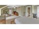 Large bedroom featuring a sitting area, workout equipment, and an en suite bathroom at 106 Kenneil Ct, Apex, NC 27502