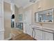 Elegant entryway with hardwood floors and wainscoting, opening to the dining room and living areas at 106 Kenneil Ct, Apex, NC 27502