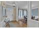 Bright entryway with hardwood floors and trim leading to the dining room at 106 Kenneil Ct, Apex, NC 27502
