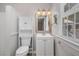 Bathroom featuring a modern sink vanity, mirror, and lighting at 1100 Brandywine Ln, Rocky Mount, NC 27804