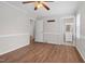 Spacious bedroom featuring wood floors, neutral paint, and ceiling fan at 1100 Brandywine Ln, Rocky Mount, NC 27804