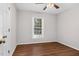 Bedroom with wood flooring, neutral walls, and a ceiling fan at 1100 Brandywine Ln, Rocky Mount, NC 27804