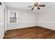 Bedroom with natural light, neutral walls, and beautiful wood flooring at 1100 Brandywine Ln, Rocky Mount, NC 27804