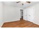 Bedroom with wood flooring, neutral walls, a ceiling fan and closet at 1100 Brandywine Ln, Rocky Mount, NC 27804