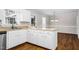 Kitchen featuring stainless steel appliances, plenty of storage space, and wood flooring at 1100 Brandywine Ln, Rocky Mount, NC 27804